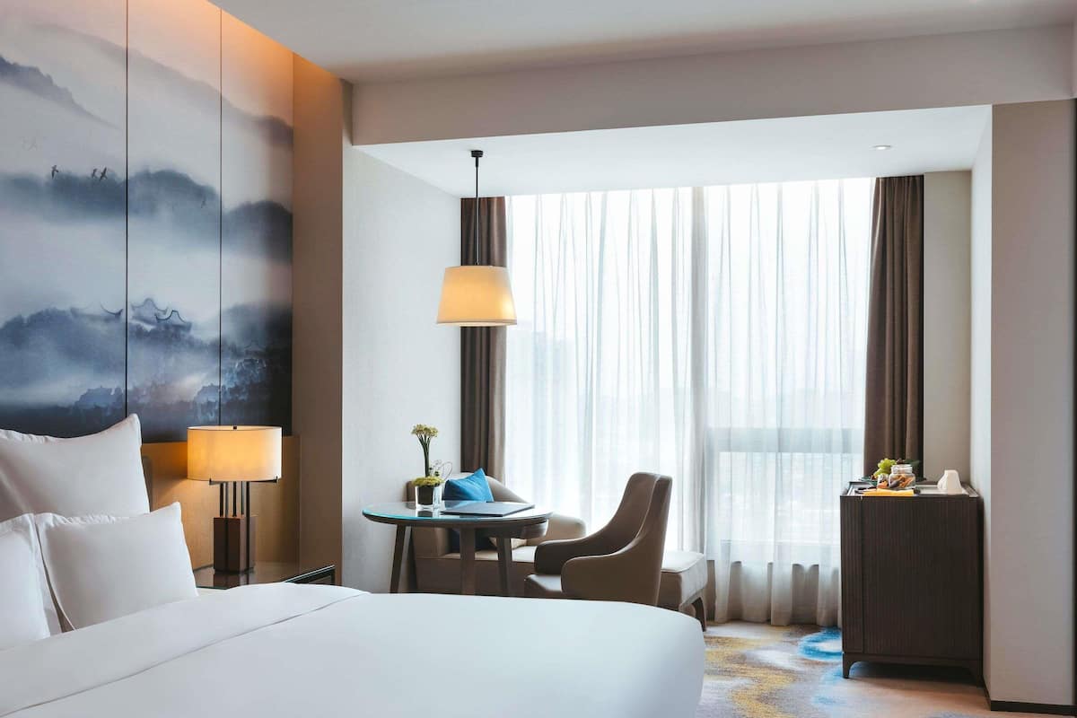 Chambre Deluxe, 1 trĂšs grand lit