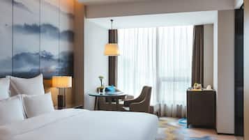 Habitación Deluxe, 1 cama King size, con acceso al salón lounge del club | 1 habitación, minibar y caja de seguridad en la habitación