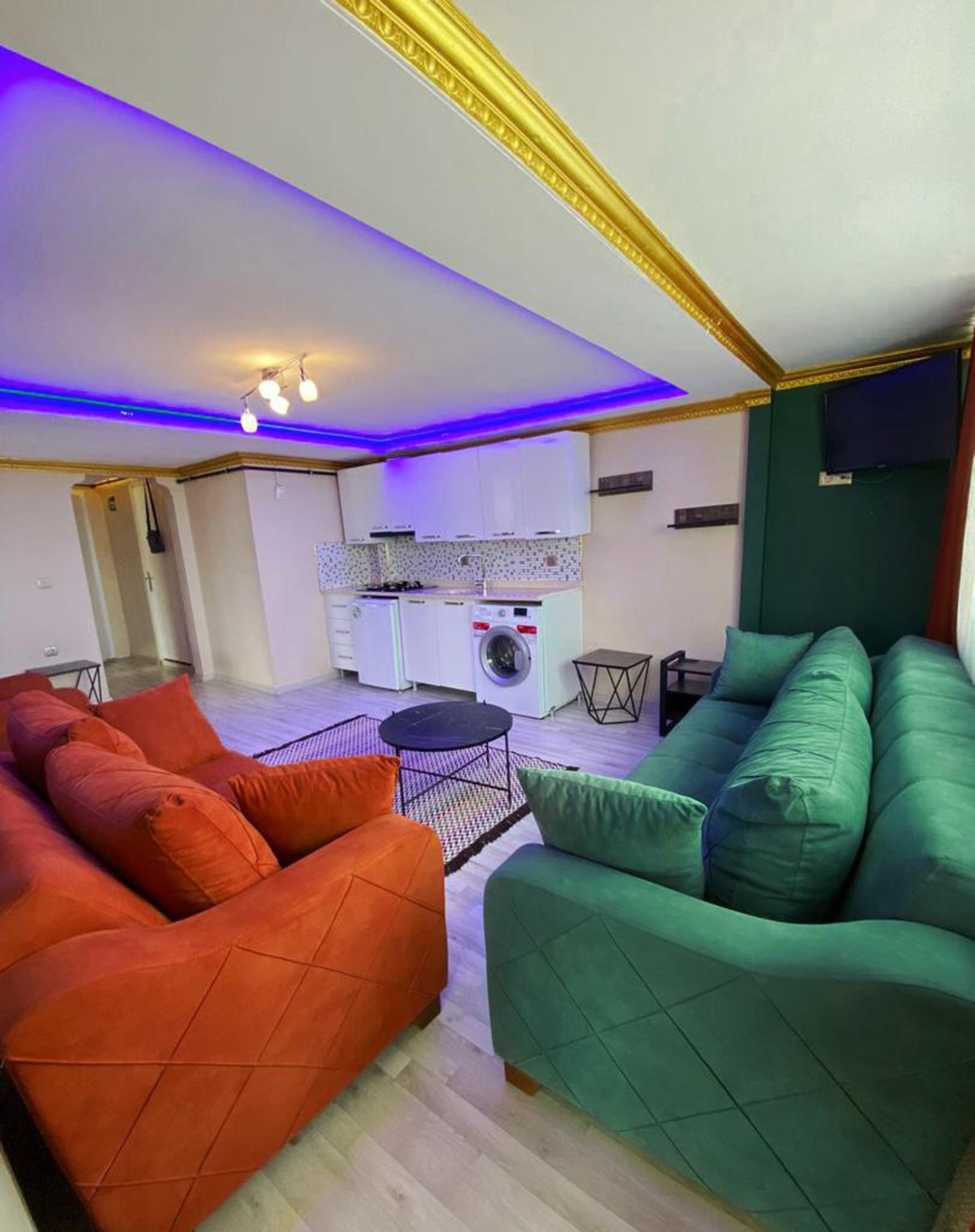 full-sized fridge, stovetop, electric kettle, cookware/dishes/utensils