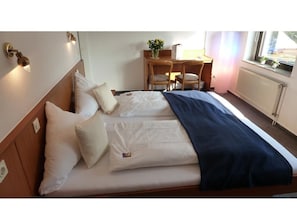 Desk, rollaway beds, free WiFi, bed sheets