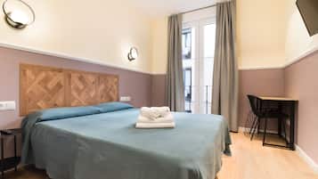 Desk, blackout drapes, soundproofing, iron/ironing board