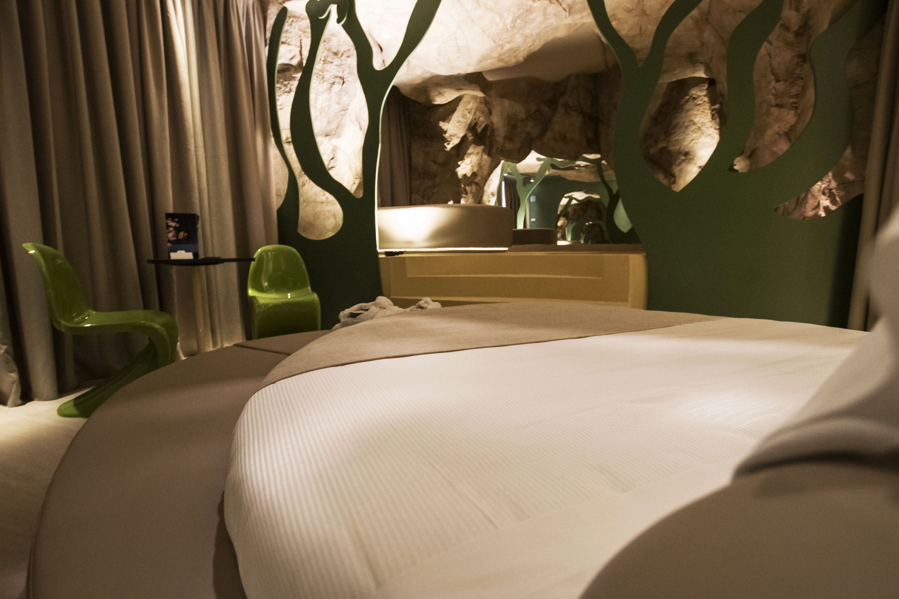 suite, jetted tub | 1 bedroom, minibar, in-room safe, individually decorated