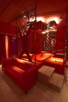 Suite (Hot) | 1 bedroom, minibar, in-room safe, individually decorated