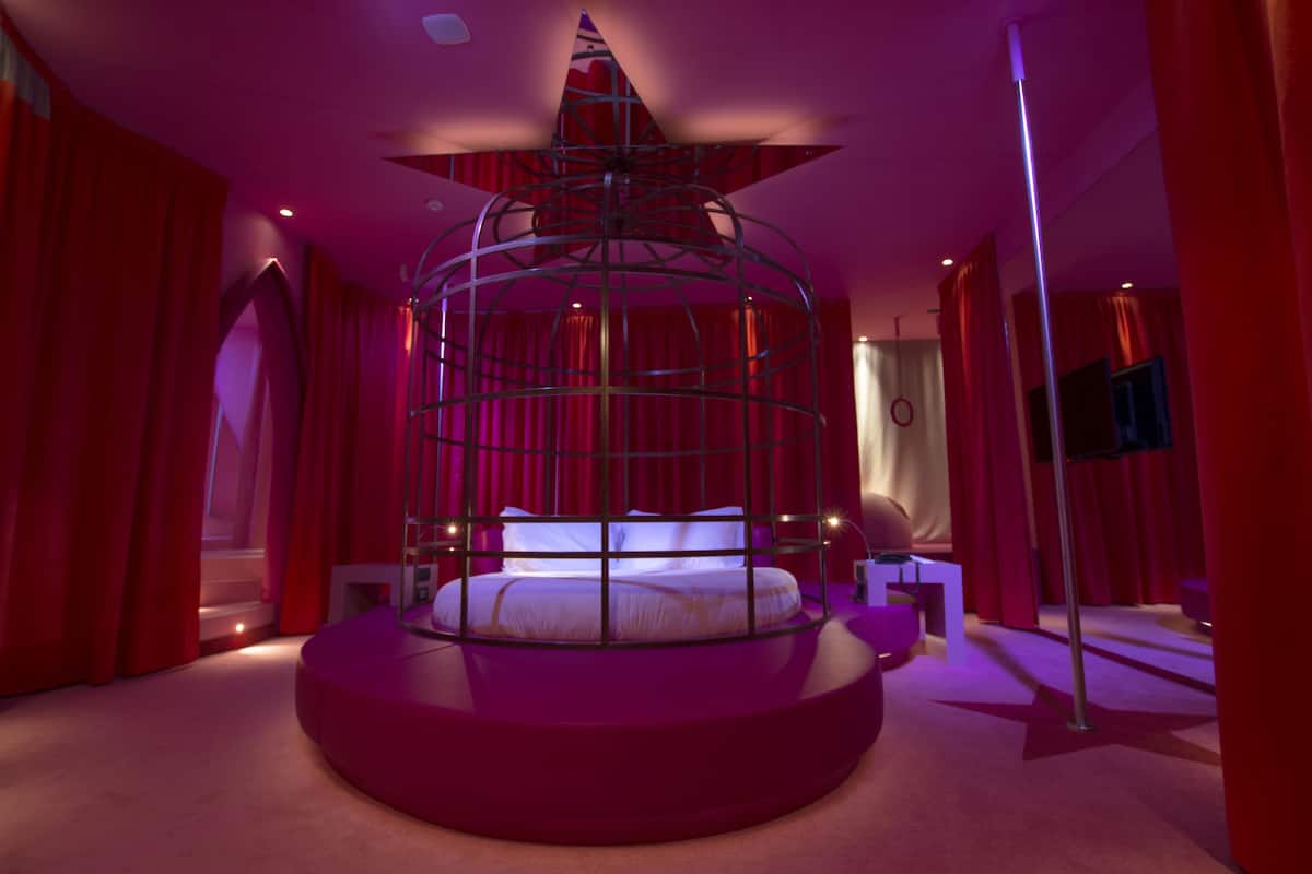 suite, jetted tub | 1 bedroom, minibar, in-room safe, individually decorated