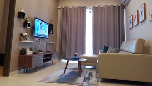 Apartment, 2 Bedrooms | Living area | Smart TV