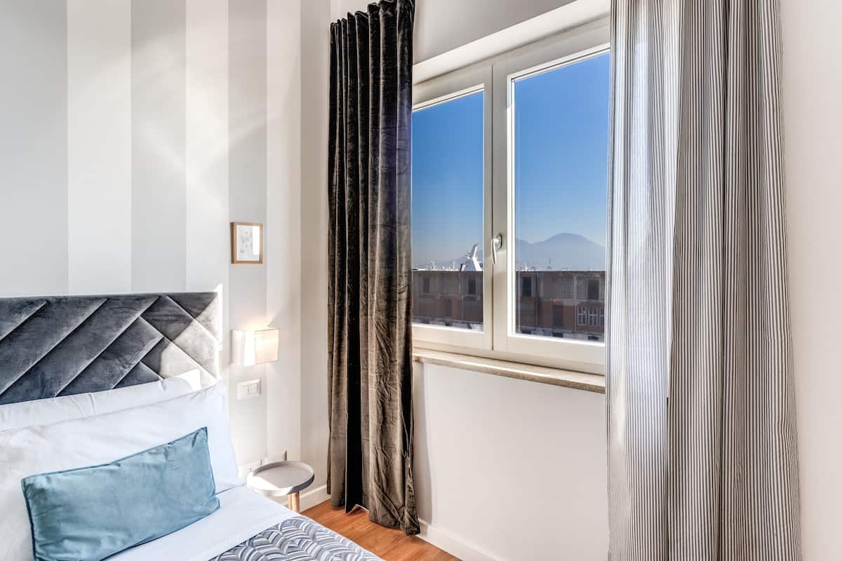 Premium bedding, down comforters, minibar, in-room safe