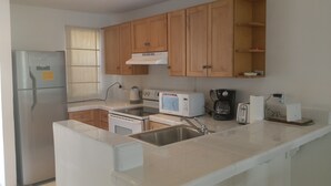Villa, 2 Bedrooms, Harbour View | Private kitchenette | Coffee/tea maker, full-sized fridge, microwave, oven - Villa 226C at Jolly Harbour (Jolly Harbour)