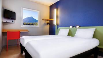 Desk, blackout drapes, soundproofing, free WiFi