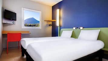 Desk, blackout drapes, soundproofing, free WiFi