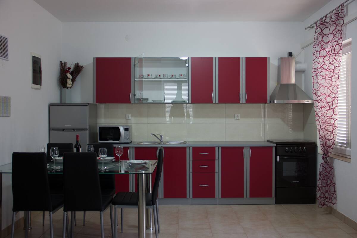 Fridge, microwave, stovetop, cookware/dishes/utensils