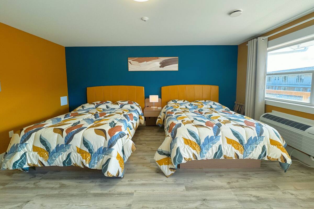 Chambre Deluxe, 2 grands lits | Bureau, système d’insonorisation, accès au Wi-Fi (inclus)