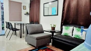 32-inch flat-screen TV with cable channels, TV, DVD player