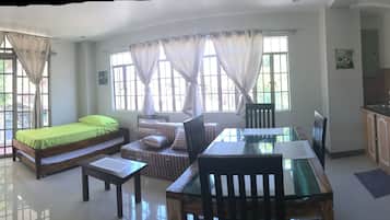 Family Studio, Multiple Beds | In-room dining
