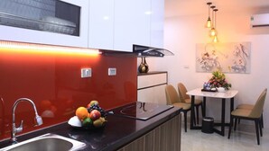 Standard Apartment | Private kitchen | Fridge, stovetop, electric kettle, cookware/dishes/utensils - New Life Condotel (Bai Chay)