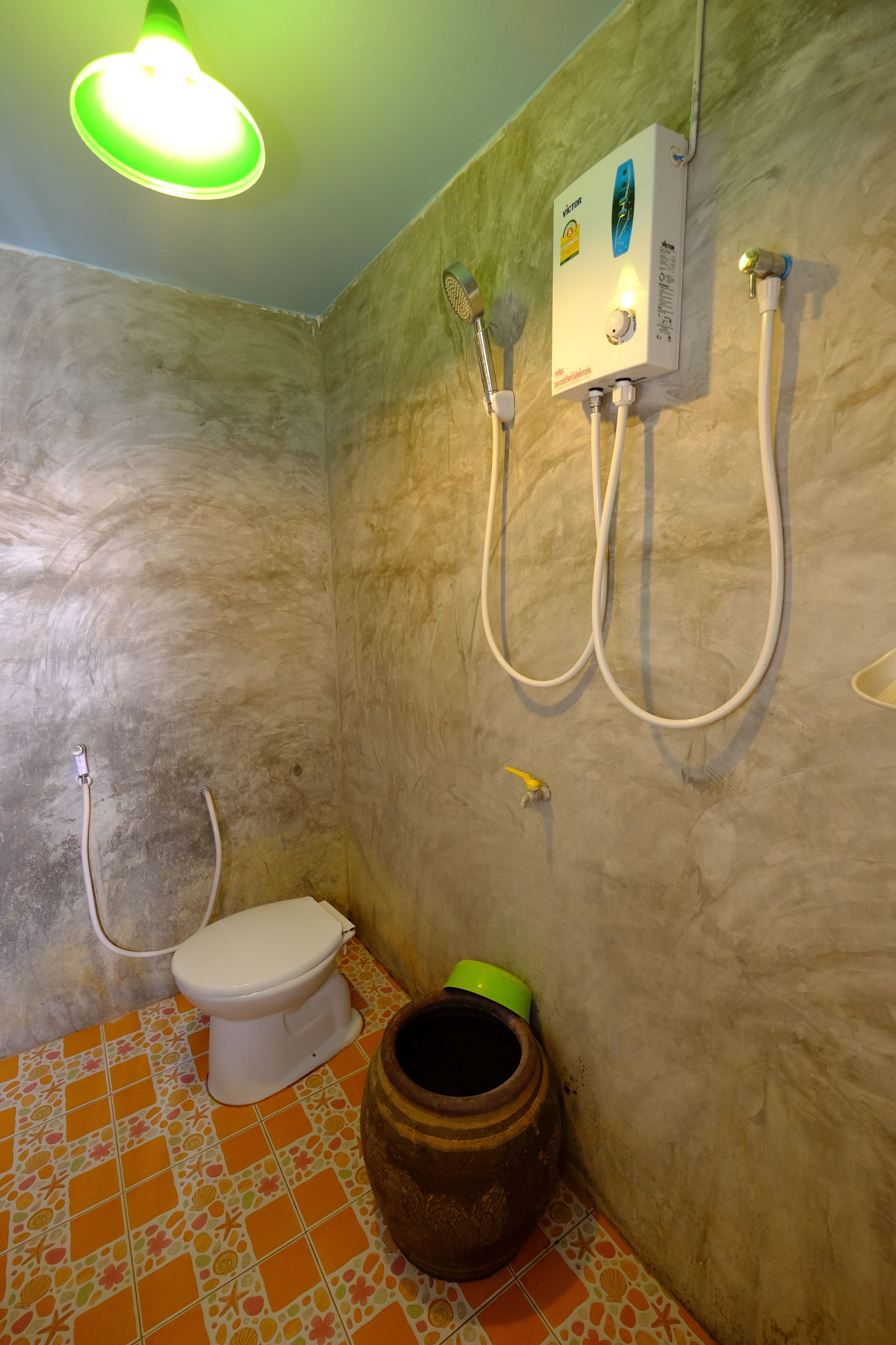 Bungalow estándar | Baño | Regadera y amenidades de baño gratuitas 