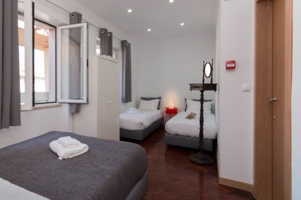 Quadruple Room, Shared Bathroom, City View | 1 bedroom, iron/ironing board, free wired internet