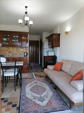 Apartment | Living area | 82-inch LCD TV with satellite channels, TV - Kalkan Koc Apart (Kas)