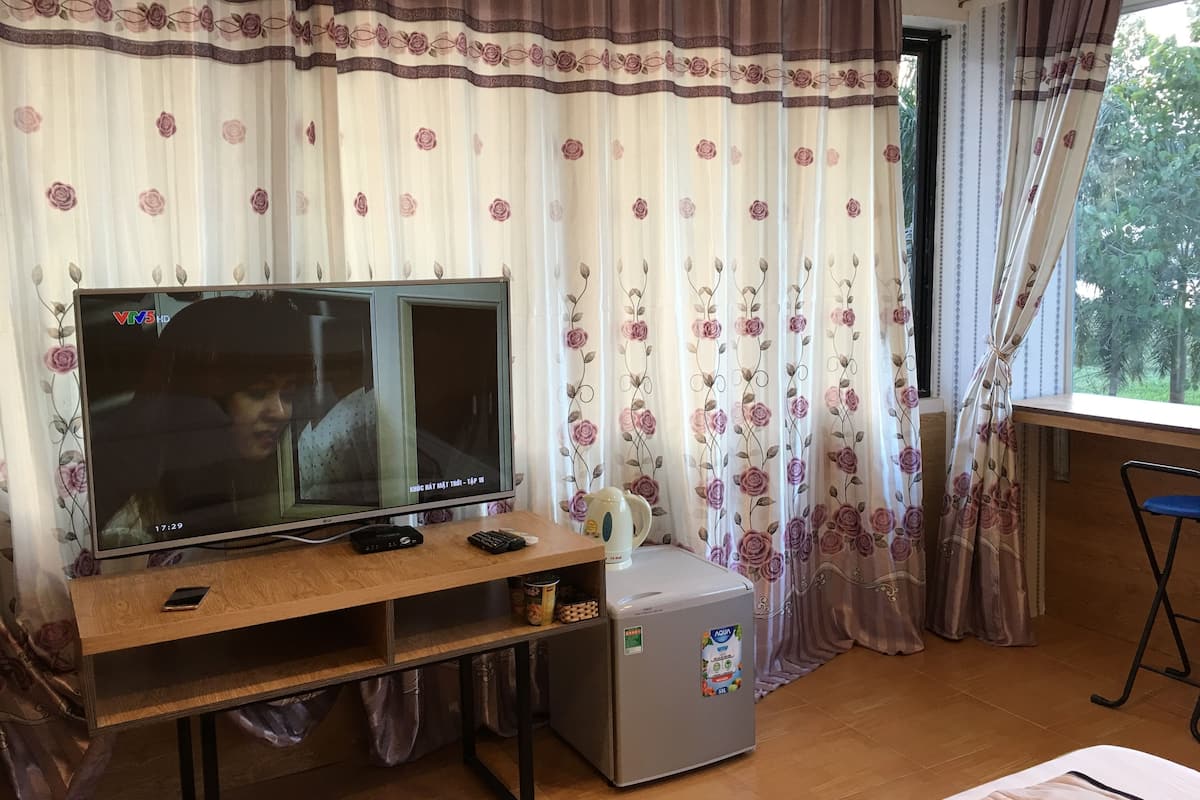 Deluxe suite, privébadkamer, uitzicht op rivier | Kamervoorziening