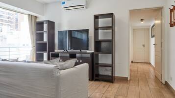 Apartment, 2 Bedrooms | Living area | 40-inch Smart TV with cable channels, TV