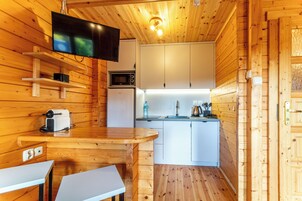 Fridge, stovetop, electric kettle, cookware/dishes/utensils