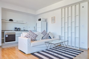 Apartment, 2 Bedrooms | Living area | 40-inch LED TV with cable channels, TV