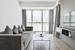 City Apartment | Living area | 40-inch LED TV with cable channels, TV - Nido at Bellini Esmeralda (Buenos Aires)