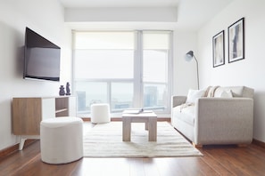 City Apartment | Living area | 40-inch LED TV with cable channels, TV