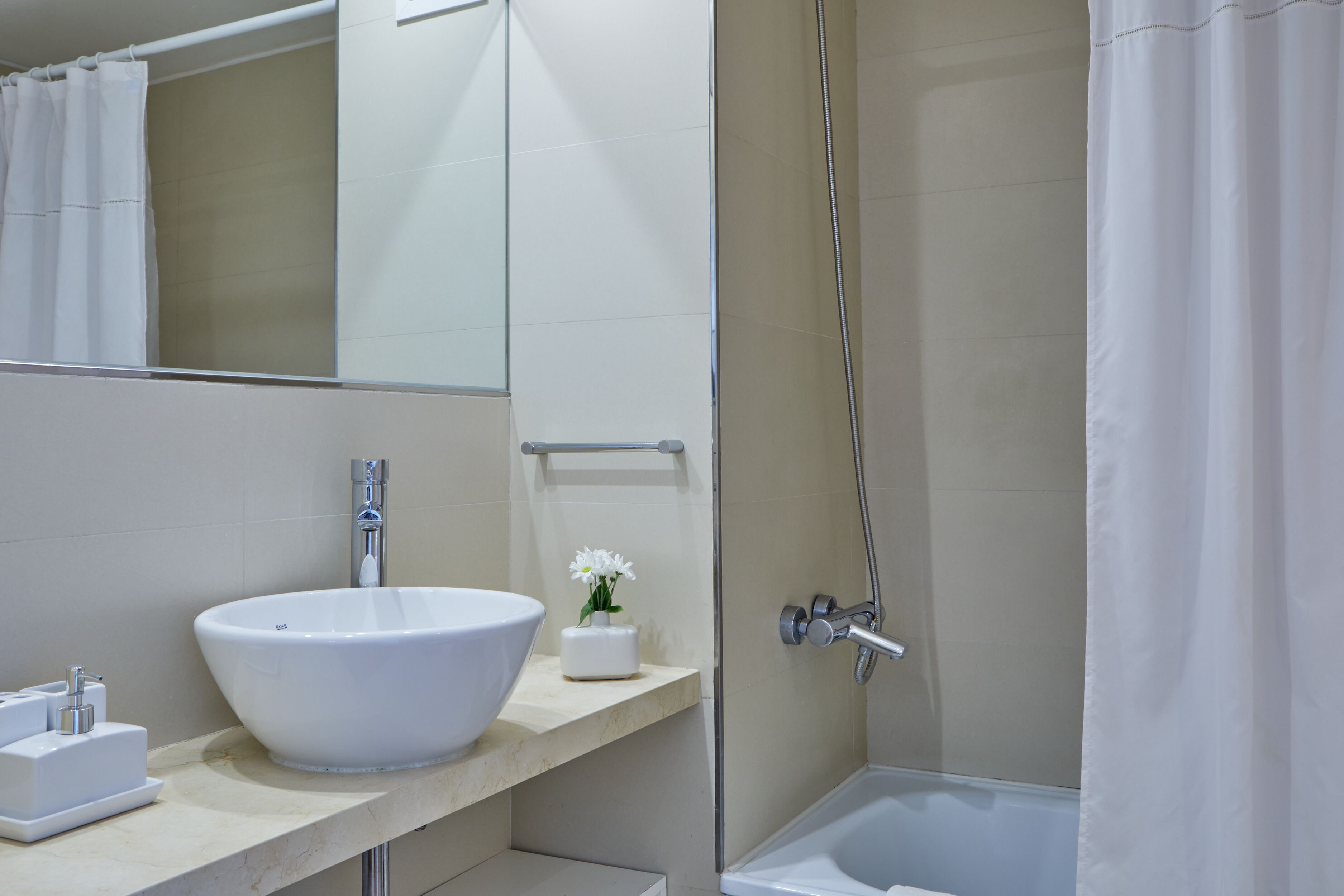 deluxe apartment, 1 bedroom, non smoking, balcony (#qp91) | bathroom | combined shower/bathtub, free toiletries, hair dryer, bidet