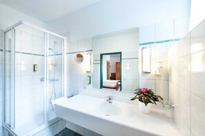 Shower, free toiletries, hair dryer, bathrobes