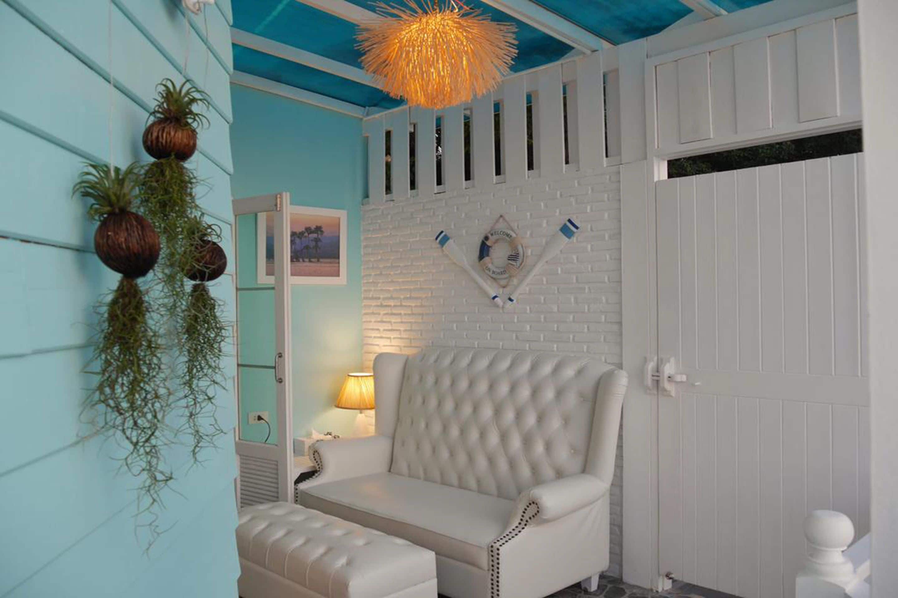 honeymoon suite with sea view | living area | lcd tv