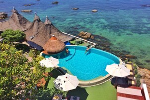 Outdoor pool, open 8 AM to 8 PM, sun loungers