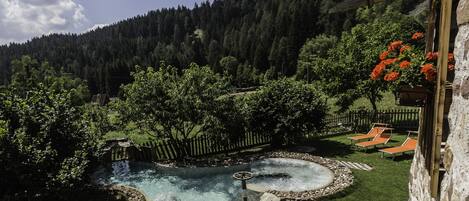 Seasonal outdoor pool, pool loungers