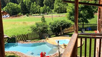 Seasonal outdoor pool, pool loungers