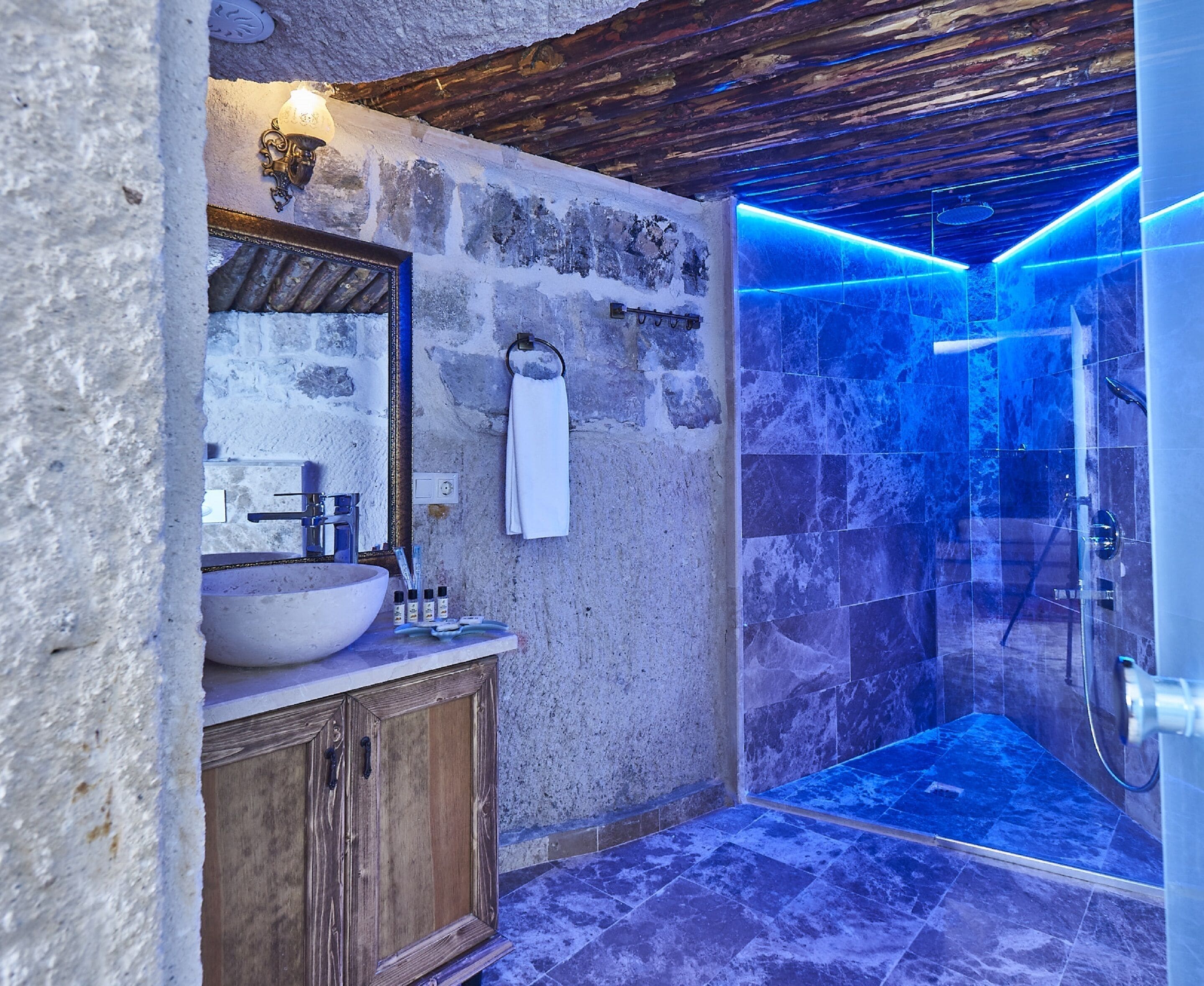 room (premier cave) | bathroom | shower, rainfall showerhead, hair dryer, slippers