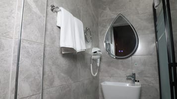 Free toiletries, hair dryer, bathrobes, slippers