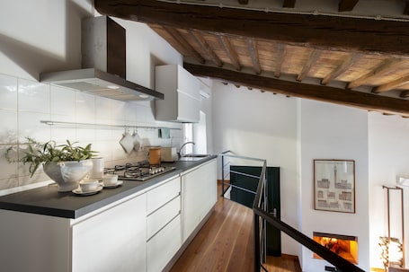 Deluxe Apartment | Private kitchen | Espresso maker, coffee/tea maker, electric kettle