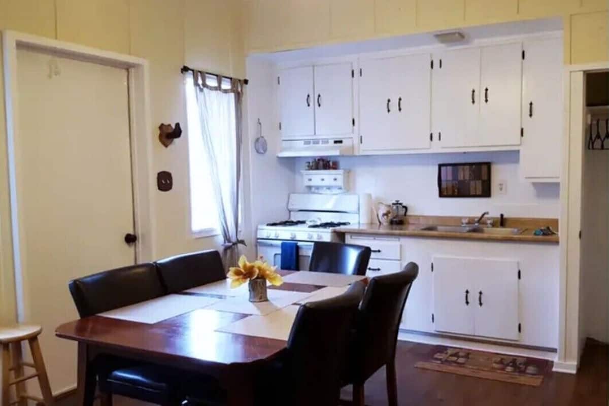 Coffee/tea maker, fridge, cookware/dishes/utensils