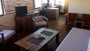 Superior Apartment, 1 Bedroom (Ambondrona) | Living room | 44-inch flat-screen TV with cable channels, TV