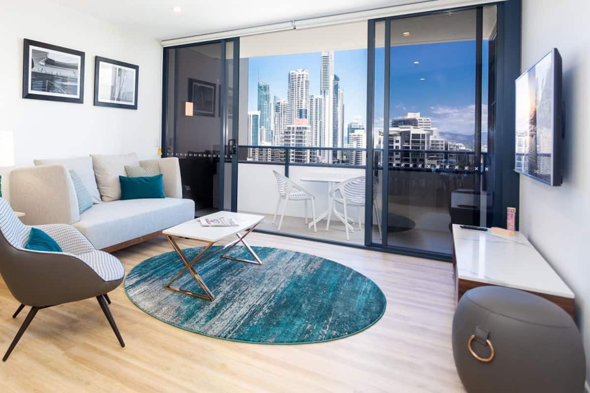 Apartamento, 1 habitación | Zona de estar | Una televisión de pantalla plana