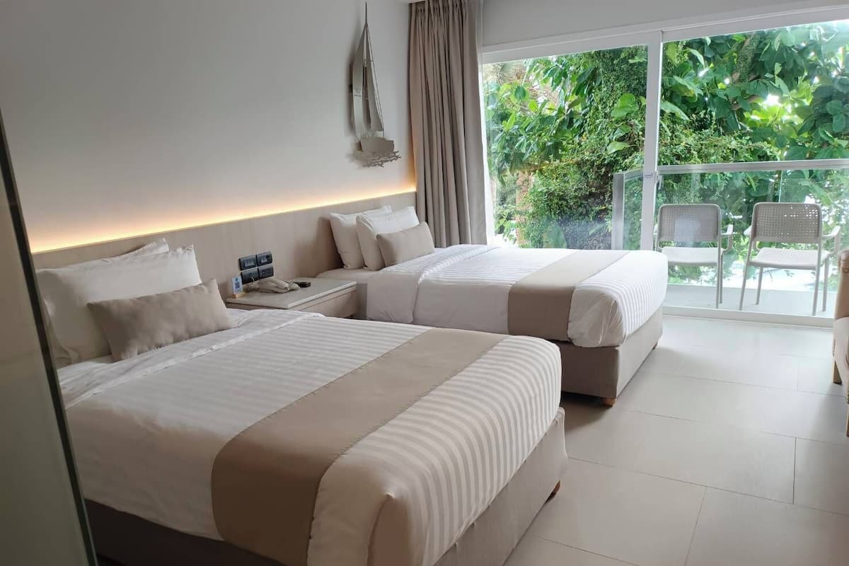 Deluxe Pool View Twin Beds | Premium bedding, minibar, in-room safe, desk