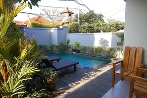 Outdoor pool, open 8:00 AM to 7:00 PM, pool loungers - Sweet Corner Guest House (Denpasar)