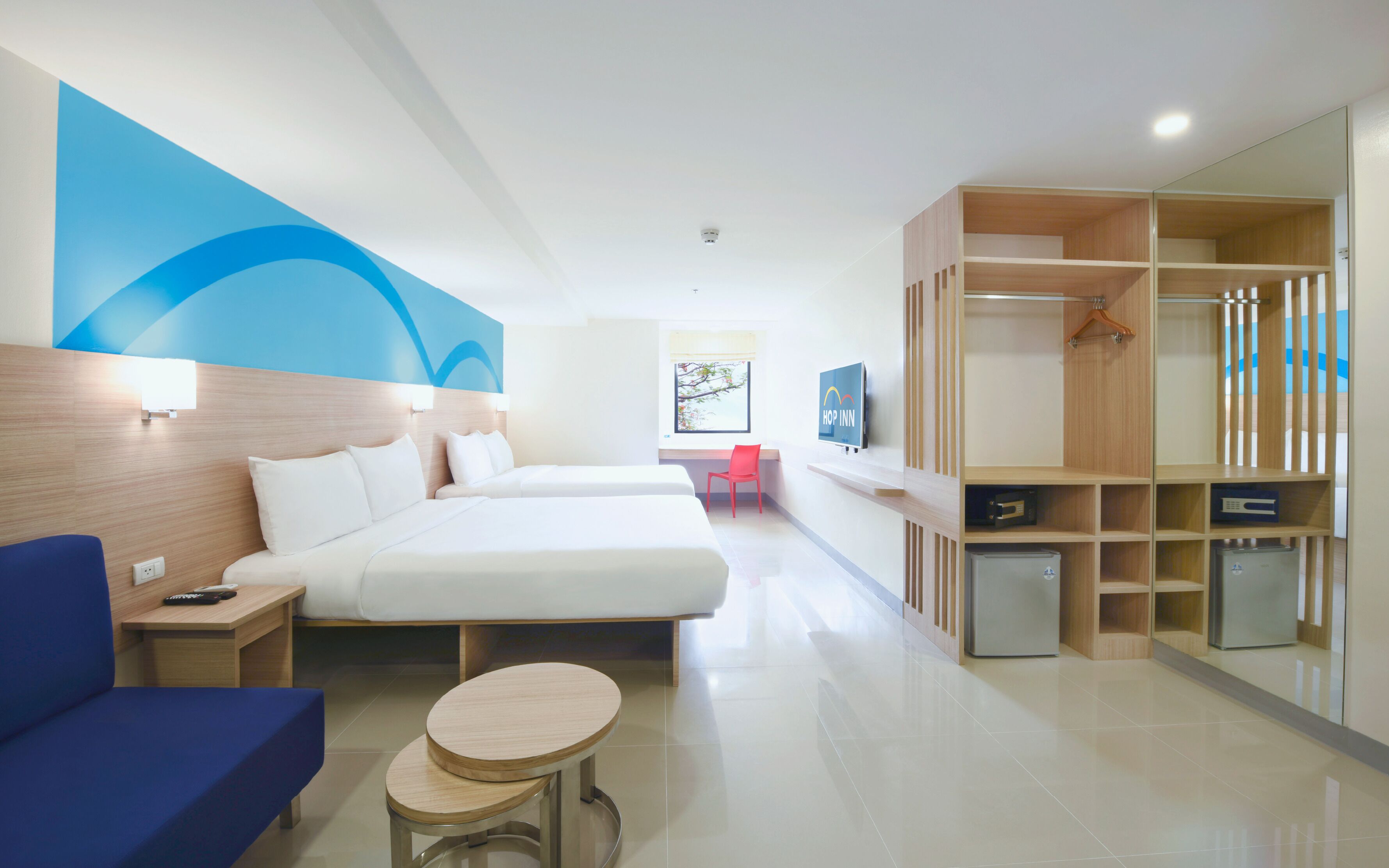 family room | down duvets, in-room safe, desk, laptop workspace