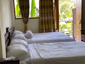 Desk, blackout curtains, free WiFi, bed sheets