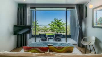 Deluxe kamer, uitzicht op zee (Non - Smoking) | Uitzicht op strand/zee