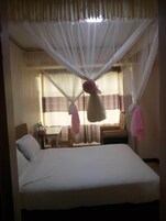 Executive Room | Desk, iron/ironing board, free WiFi, bed sheets