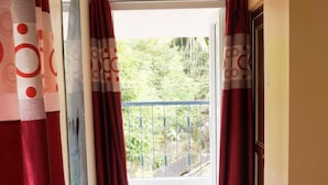 A corridor with a view to a balcony. - Sunnyvale Andaman (Port Blair)