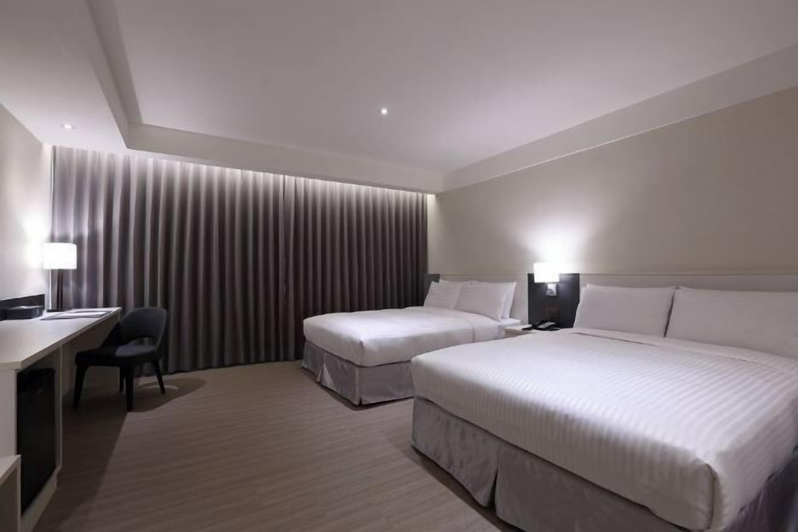 Desk, laptop workspace, blackout drapes, soundproofing