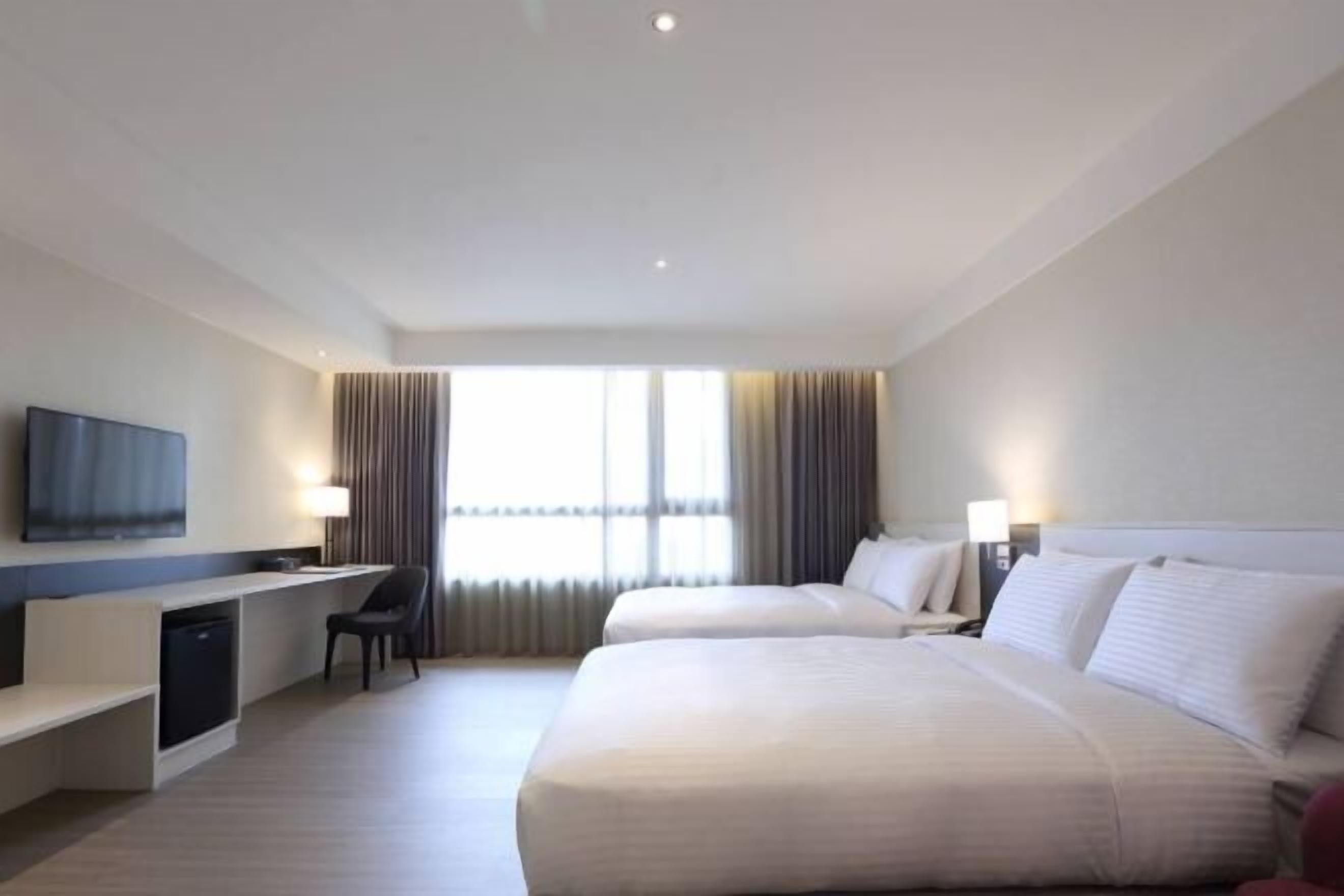 Desk, laptop workspace, blackout drapes, soundproofing