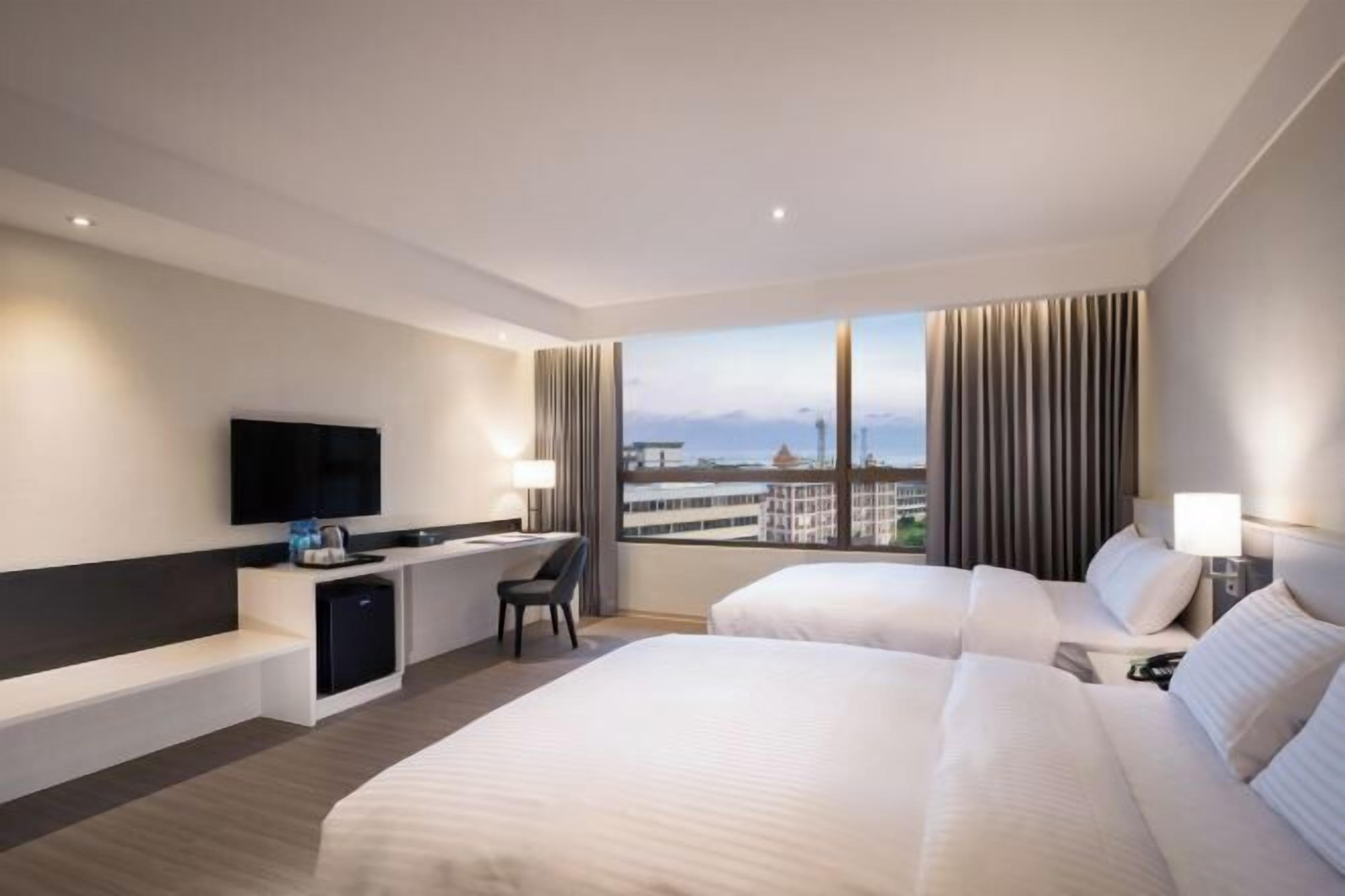 Desk, laptop workspace, blackout drapes, soundproofing