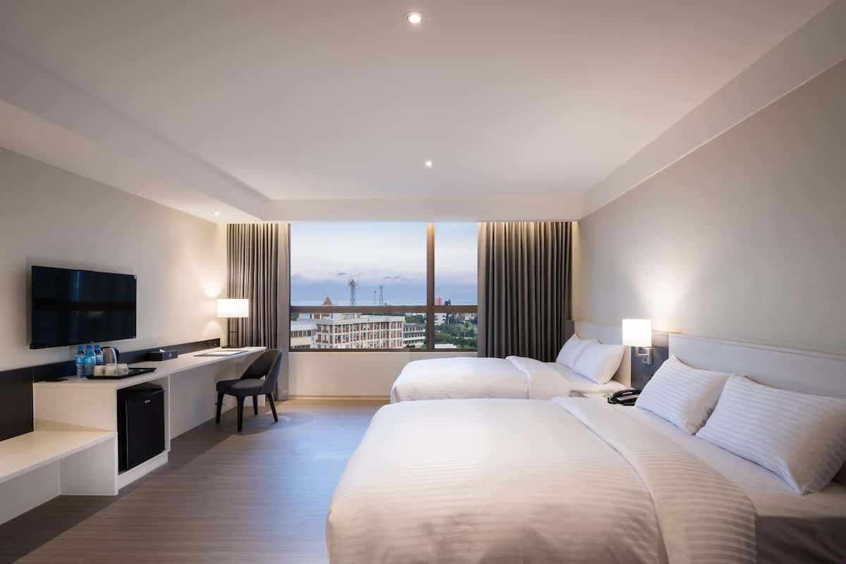 family quadruple room, 2 double beds, bathtub | 1 bedroom, desk, laptop workspace, blackout curtains